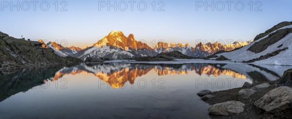 Evening mood, mountain landscape at sunset, alpenglow, water reflection in Lac Blanc with mountain