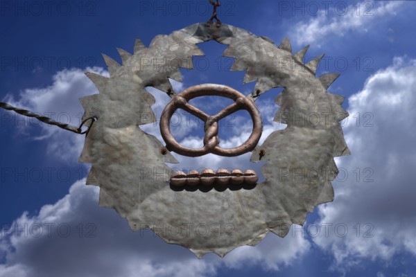Nose sign of a café against a cloudy sky, Egloffstein, Upper Franconia, Bavaria, Germany, Europe