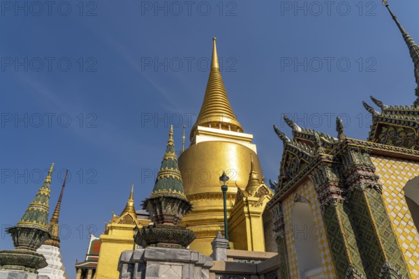 Golden Phra Sri Rattana Chedi in Wat Phra Kaeo, the king's Buddhist temple, Grand Palace Bangkok,