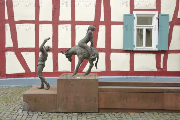 Carnival fountain by Walter Meffert 2001 with two sculptures, scene with historical custom at