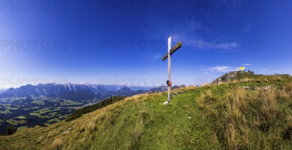 Summit cross on the Einberg with a view of the Lammertal and Tennengebirge mountains, Osterhorn