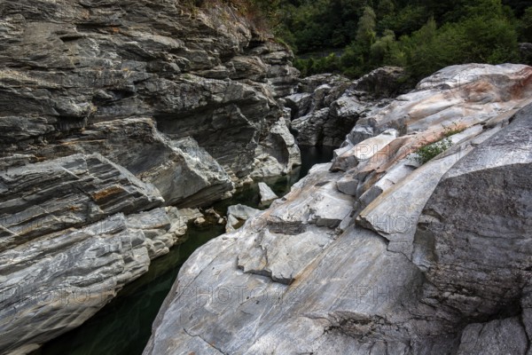 Rocks, granite rock formations in the Maggia River near Ponte Brolla, in the Maggia Valley, Valle