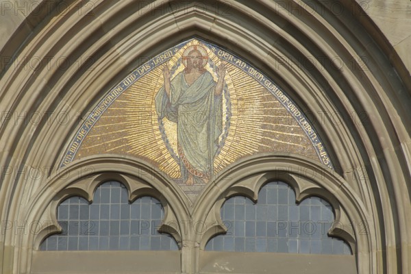 Tympanum with Christ and biblical quotation - I am the resurrection and the life whoever believes
