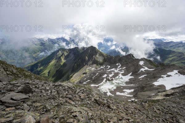 Cloudy mountain landscape at the summit of Lasörling, view to Berger Kees and mountain peak