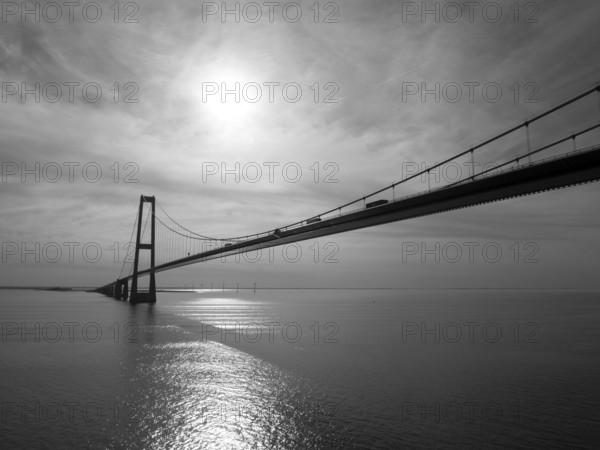 Lorry traffic on Storebæltsbroen, bridge, black and white photography, Nyborg, Denmark, Europe