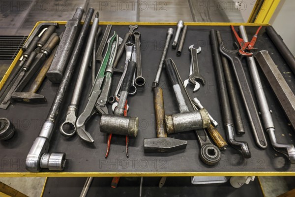 Übach-Palenberg, North Rhine-Westphalia, Germany - Tools on a tool trolley in an industrial hall of