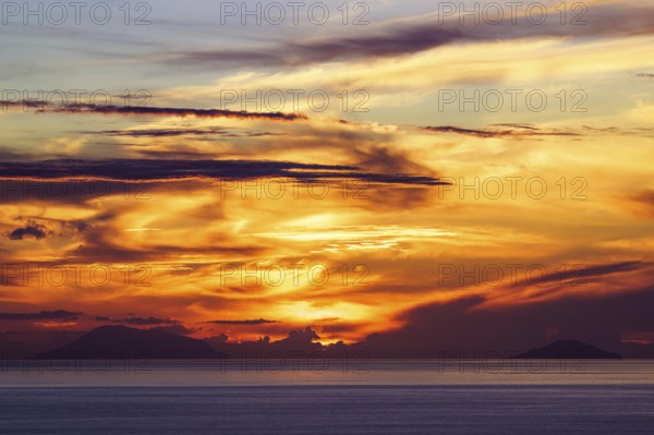 Sunset over Aeolian Islands from Nicotera, Aeolus, Sicily, Tyrrhenian Sea, Italy, Europe