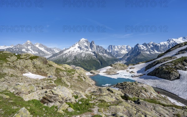 Mountain landscape with mountain lake Lac Blanc, mountain peaks, Aiguille Verte, Grandes Jorasses,