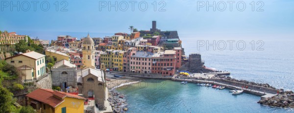 Cinque Terre, Italy, Scenic view of Vernazza shoreline and colorful buildings in a bay, Europe