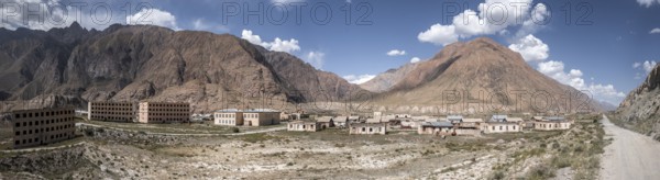 Panorama, Abandoned destroyed building in mountain landscape, Ghost town, Engilchek, Tian Shan,