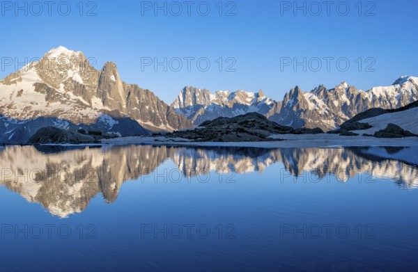 Mountain landscape in the evening light, water reflection in Lac Blanc, mountain peak, Aiguille