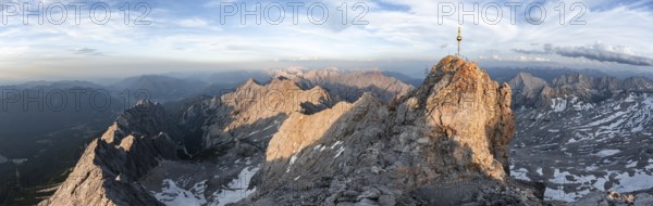 Impressive rocky mountain landscape in the evening light, summit of the Zugspitze with summit