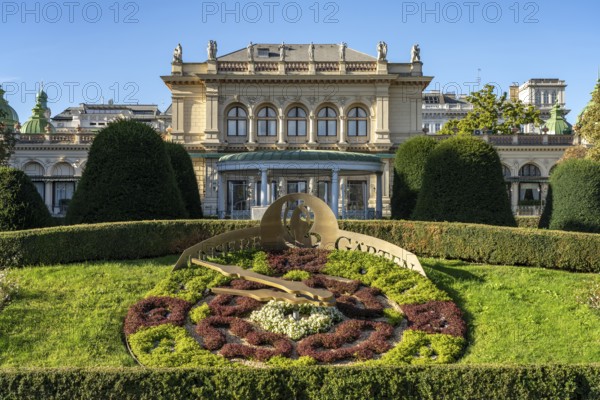 Flower clock and Kursalon Hübner in Vienna City Park, Vienna, Austria, Europe