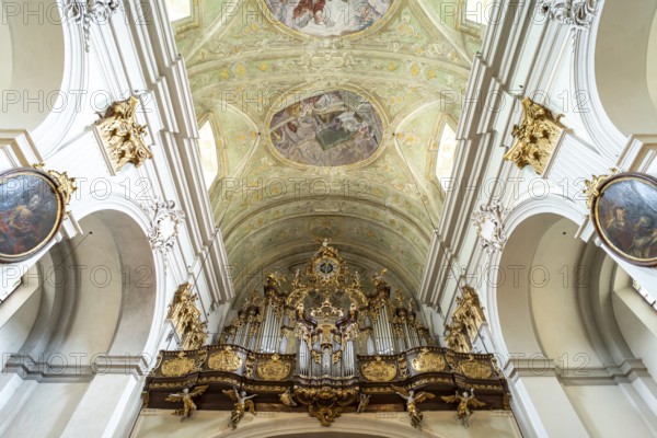 Church organ and ceiling frescoes in the baroque parish church Mariahilfer Kirche in Vienna,