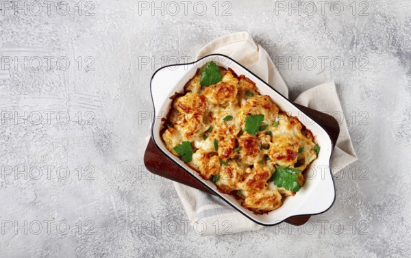 Baked cauliflower, in cream sauce, with cheese and spices, homemade, no people