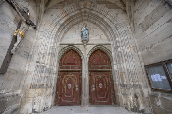 Male portal in Baroque style, late Gothic hall church of St George, Dinkelsbühl, Bavaria, Germany,