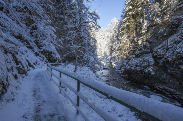 Winter, snowy landscape, river Breitach and hiking trail through the Breitachklamm gorge near