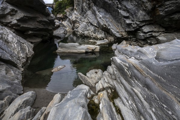 Rocks, granite rock formations in the Maggia River near Ponte Brolla, in the Maggia Valley, Valle