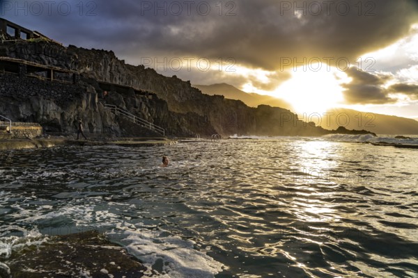 Sunset at the natural swimming pool La Maceta, El Hierro, Canary Islands, Spain, Europe
