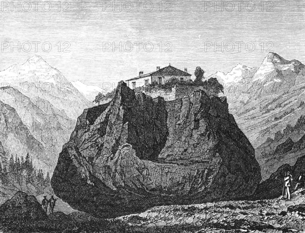 Valley in the Jura with hiking block near Monthey with building, erratic block, geology, erratic