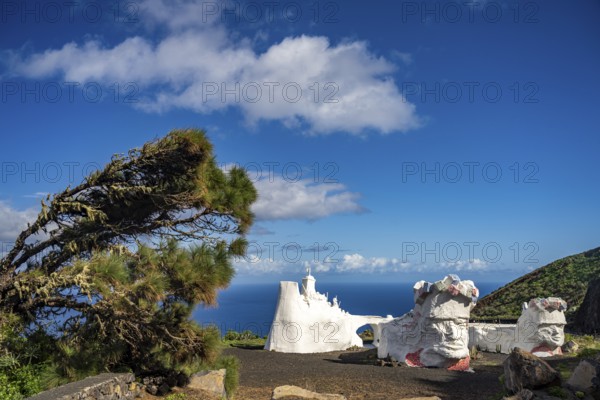 White sculpture made of scrap metal and plaster Homenaje a La Bajada near Valverde, capital of the