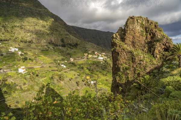 One of the twin rocks Roques de San Pedro, landmark of Hermigua, La Gomera, Canary Islands, Spain,
