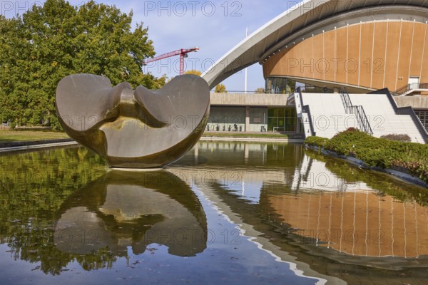 House of World Cultures with sculpture Butterfly by Henry Moore and reflection on the water surface
