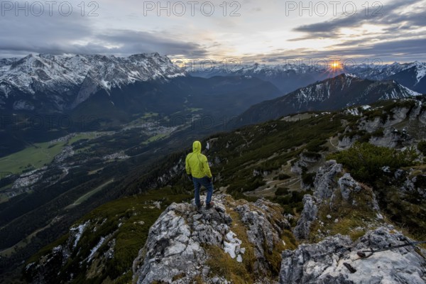 View Mountain panorama with Wetterstein mountains and Zugspitze, at sunset with sun star,