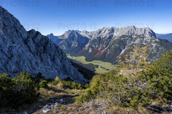 Mountain landscape in autumn, view of the Leutasch valley with mountain peak of the Wetterstein