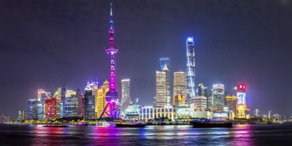 Shanghai skyline at the Bund with Oriental Pearl Tower city centre Downtown Pudong panorama at