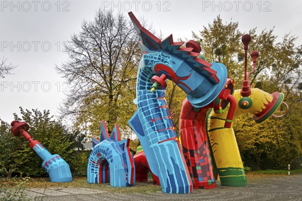 Nessy-Family by Inge Loerke, the sea monsters blow fresh air into the underground canal,