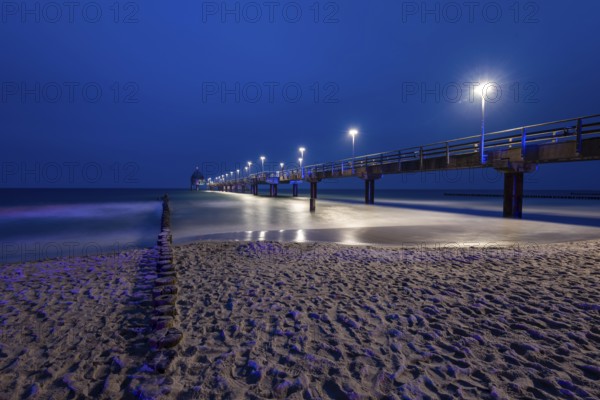 Pier with diving gondola in the morning at the blue hour, breakwater, Zingst,