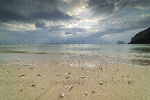 Sunrise at the shell-lined Charlie Beach, Koh Mook Island, Andaman Sea, Satun Province, Southern