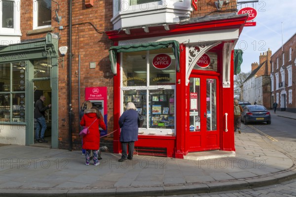 Post Office corner shop painted bright red, Eastgate, Bailgate, Uphill area of city of Lincoln,