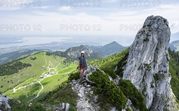 Climber with climbing rope on a climbing tour, climber on a mountain ridge, alpine climbing,