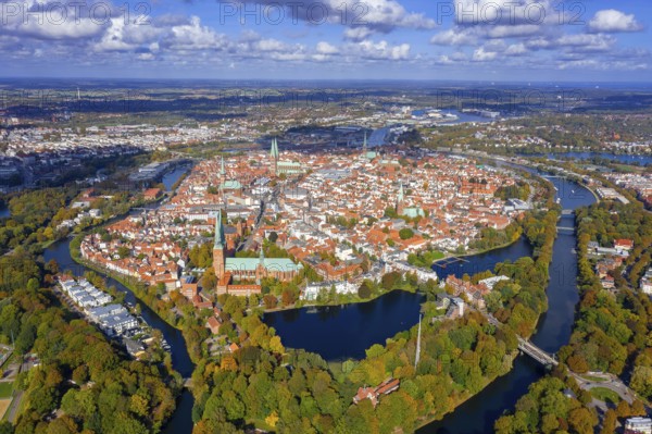 Aerial view over the river Trave and church towers in the old town of the Hanseatic City of Lübeck