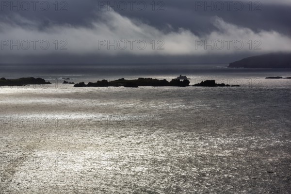 Coastline with rocky islands, viewpoint, dramatic light, Slea Head Drive, Dingle Peninsula, Kerry,