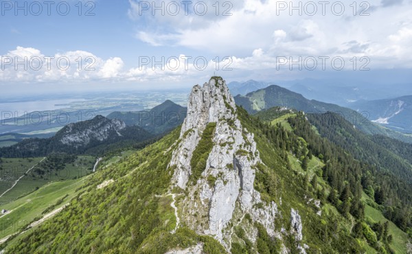 Narrow mountain ridge, summit of the Kampenwand with summit cross at the back, alpine climbing,