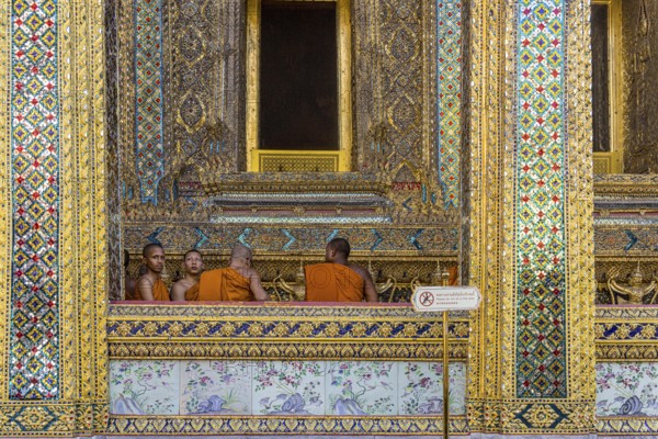 Wat Phra Kaeo temple, royal palace. Royal chapel with Buddhist monks and novices. Bangkok,