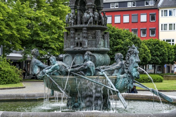 Detail of the historical column of the fountain on Josef-Görres-Platz in the historic centre of