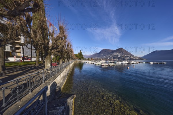 Lake, mountains, haze, marina, trees, lakeside promenade, blue sky, veil clouds, Lake Lugano,