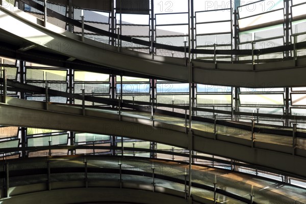 Spiral-shaped entrance and exit ramps for cars in a multi-storey car park, Berlin, 22.01.2025,