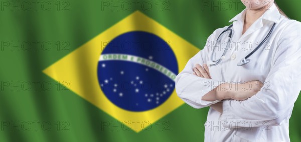 Doctor with crossed arms on Brazilian flag. Brazilian Health and Care concept. Female doctor on
