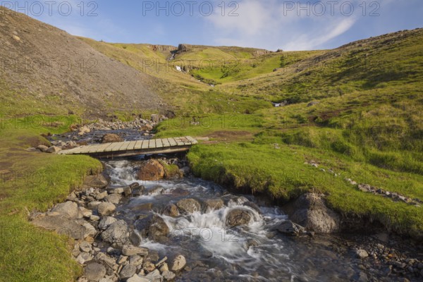 Flowing water below the waterfall. Hengifoss waterfall is located in Hengifossá in