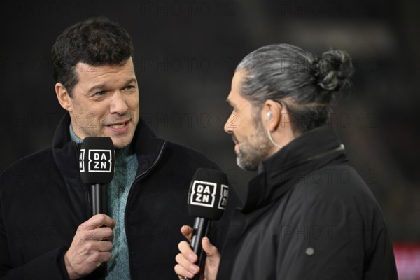DAZN TV expert Michael Ballack, portrait, in an interview with reporter Daniel Herzog Microphone