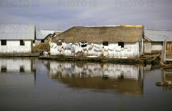 Informal shelters built on logs, known as the floating city, Manaus, Brazil 1962