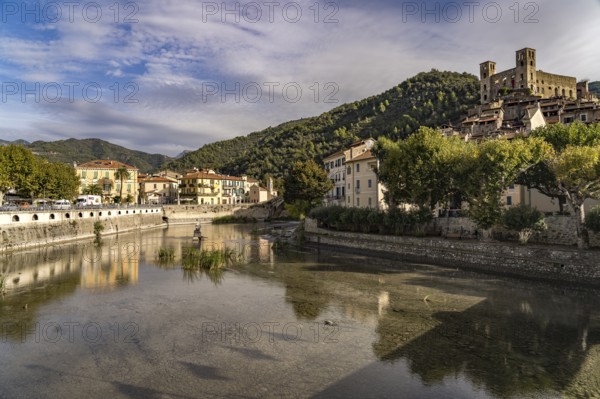 Town view with the Nervia river and the Castello dei Doria castle in Dolceacqua, Liguria, Italy,