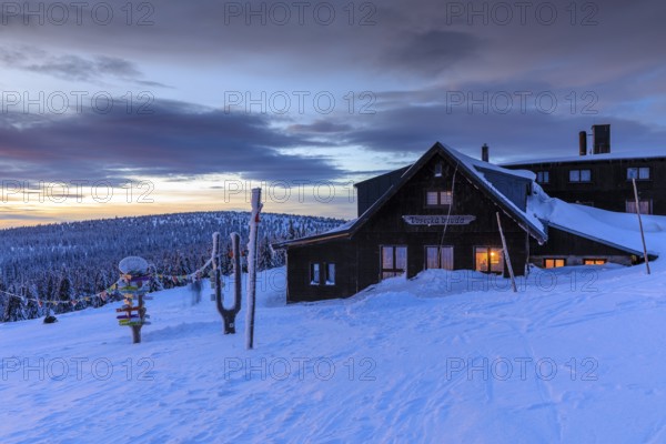Wossecker Baude at dusk on a winter's day, Harrachsdorf in the Giant Mountains, Czech Republic,
