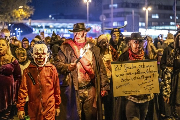 The Zombiewalk in Essen, on Halloween several hundred people, some dressed as scary zombies,
