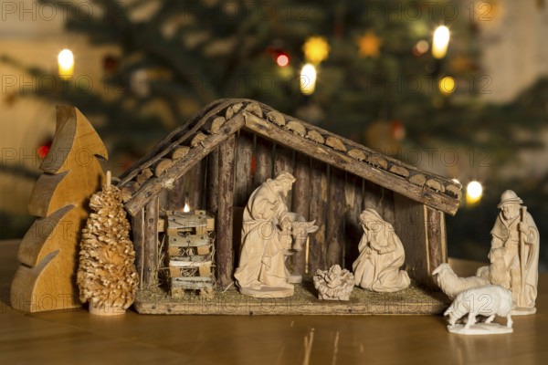 Stable with the Holy Family, shepherd and sheep come to the cot, nativity scene scene, Christmas